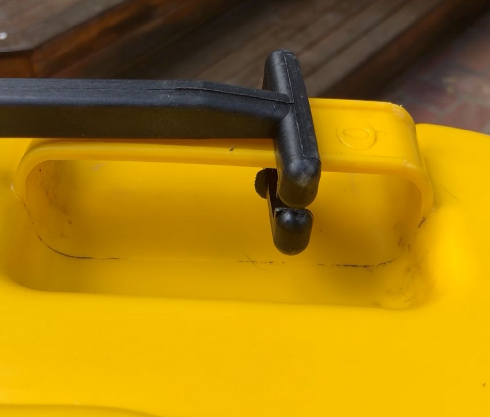 Close up of BLIP bin lid opener attaching to handle of bin